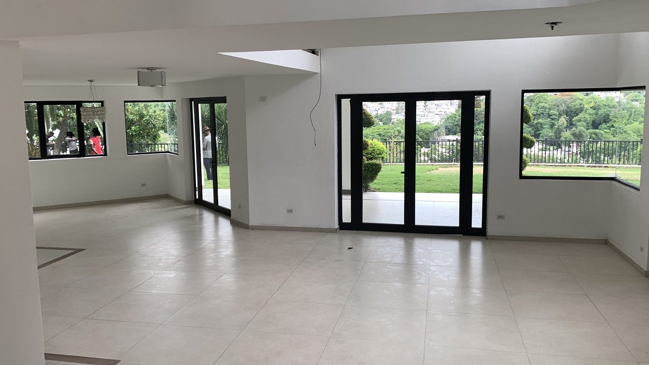 Newly Renovated FURNISHED MEGA LUXURY HOUSE for SALE, Juvenat (Yards from Karibe Hotel), Petion-Ville, Haiti – 4 Spacious Bedrooms, 3 1/2 Baths, Brand New Modern Furniture & Appliances,  Contemporary Island Kitchen, Manicured Backyard, Space for Sparkling Swimming Pool, 24/7 Robust Solar-Powered Electricity, Backup Generator, Security Guards on Rotation, WiFi/Internet, Servant Quarter, 10+ Parking Spaces, Lots of Greenery, Fruit, Vegetable, Tropical Trees, and More…