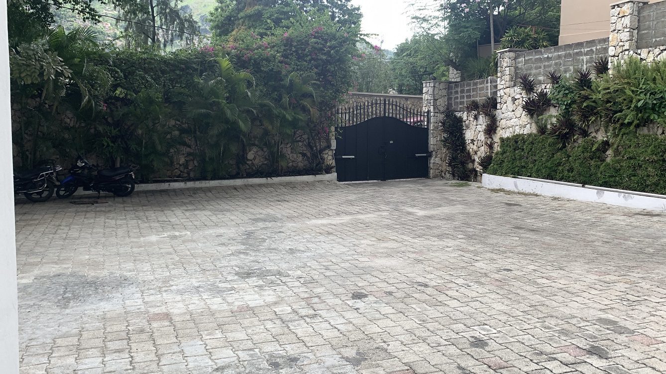 Newly Renovated FURNISHED MEGA LUXURY HOUSE for SALE, Juvenat (Yards from Karibe Hotel), Petion-Ville, Haiti – 4 Spacious Bedrooms, 3 1/2 Baths, Brand New Modern Furniture & Appliances,  Contemporary Island Kitchen, Manicured Backyard, Space for Sparkling Swimming Pool, 24/7 Robust Solar-Powered Electricity, Backup Generator, Security Guards on Rotation, WiFi/Internet, Servant Quarter, 10+ Parking Spaces, Lots of Greenery, Fruit, Vegetable, Tropical Trees, and More…