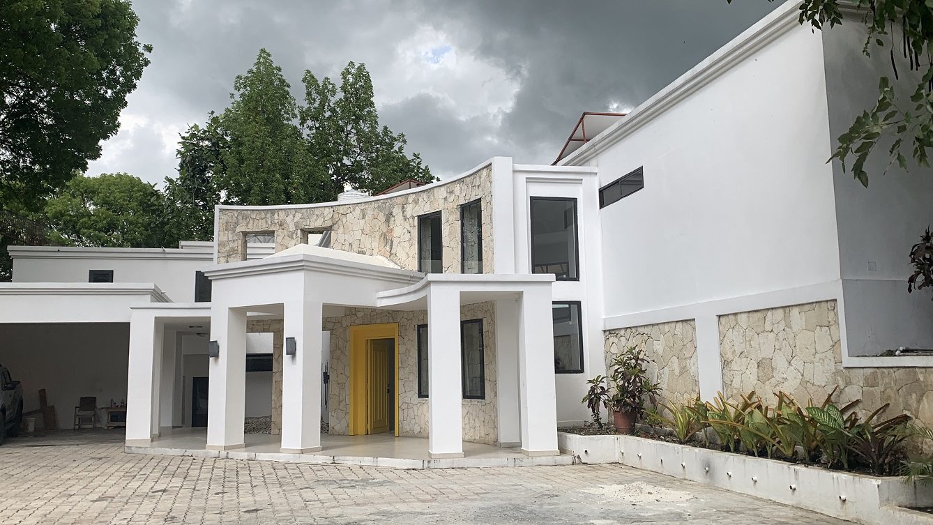 Newly Renovated FURNISHED MEGA LUXURY HOUSE for SALE, Juvenat (Yards from Karibe Hotel), Petion-Ville, Haiti – 4 Spacious Bedrooms, 3 1/2 Baths, Brand New Modern Furniture & Appliances,  Contemporary Island Kitchen, Manicured Backyard, Space for Sparkling Swimming Pool, 24/7 Robust Solar-Powered Electricity, Backup Generator, Security Guards on Rotation, WiFi/Internet, Servant Quarter, 10+ Parking Spaces, Lots of Greenery, Fruit, Vegetable, Tropical Trees, and More…