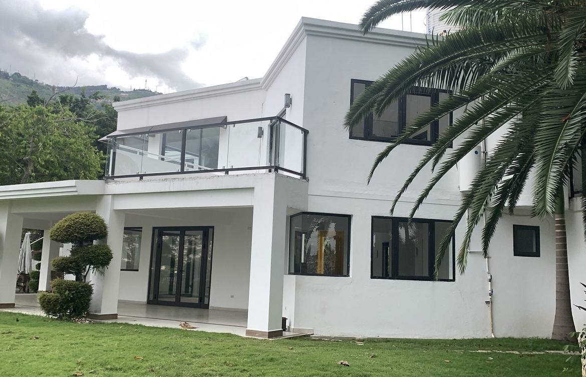 Newly Renovated FURNISHED MEGA LUXURY HOUSE for SALE, Juvenat (Yards from Karibe Hotel), Petion-Ville, Haiti – 4 Spacious Bedrooms, 3 1/2 Baths, Brand New Modern Furniture & Appliances, Contemporary Island Kitchen, Manicured Backyard, Space for Sparkling Swimming Pool, 24/7 Robust Solar-Powered Electricity, Backup Generator, Security Guards on Rotation, WiFi/Internet, Servant Quarter, 10+ Parking Spaces, Lots of Greenery, Fruit, Vegetable, Tropical Trees, and More…