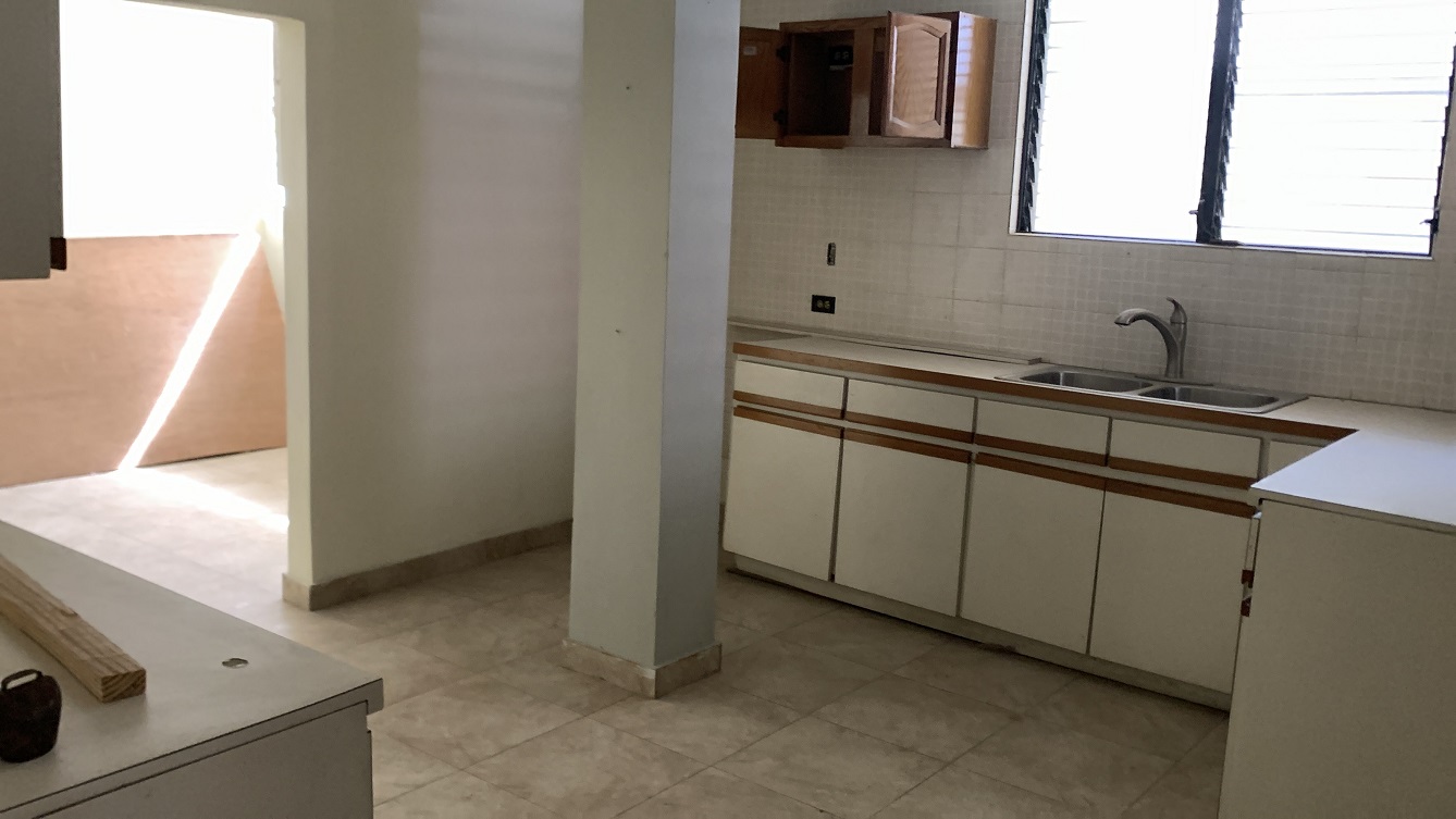 Sold by Owner Spacious House for Sale in Delmas 65, Port-au-Prince, Haiti – 5 Grand Bedrooms, 4 Bathrooms, Living & Dining Rooms, Modern Kitchen, 3 Huge Balconies, Large Backyard, Servant Quarter, Storage Rooms, Water Reservoir & Towers,  Built in 1989 on 516m² (6 Centiemes or 5,554.18) of Flat Land, 5+ Car Parking Spaces, High Walls/Fences, Safe Mixed Residential & Commercial Neighborhood – 15+ Office Space Conversion or Private Multi-Family Home