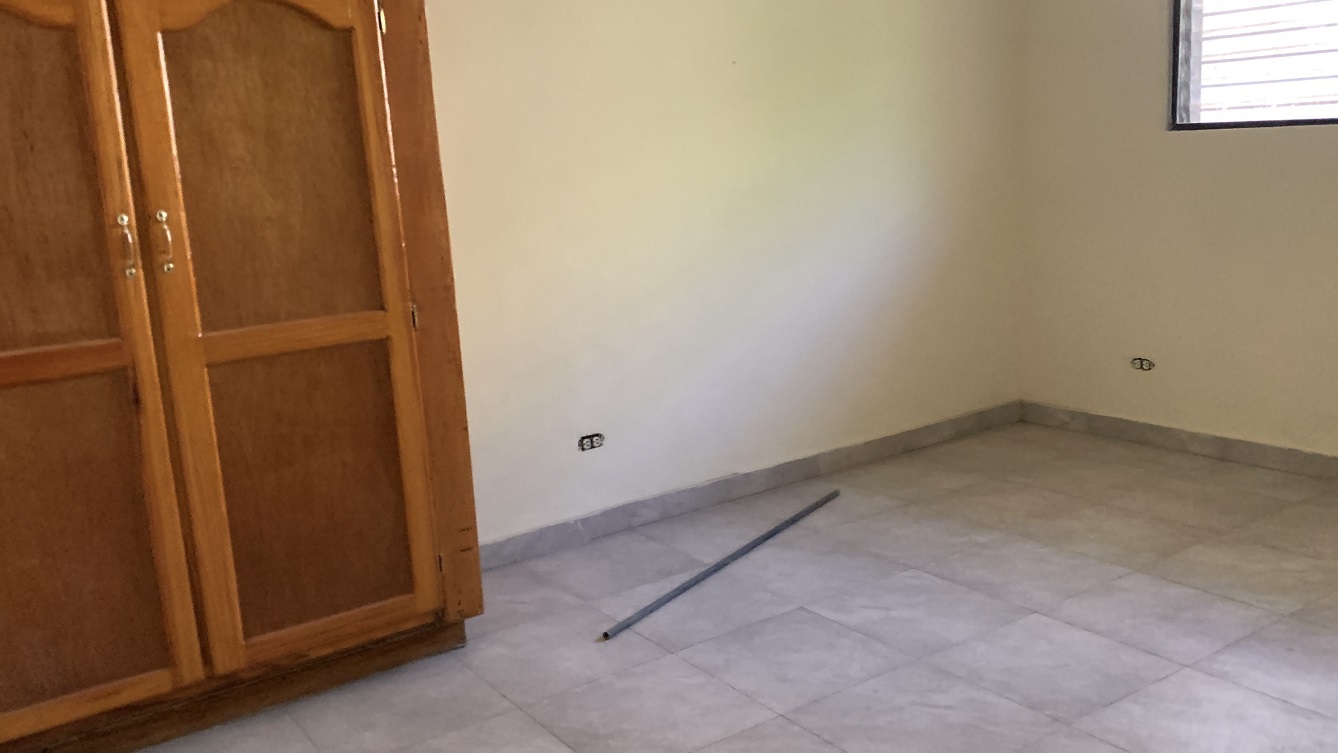 Sold by Owner Spacious House for Sale in Delmas 65, Port-au-Prince, Haiti – 5 Grand Bedrooms, 4 Bathrooms, Living & Dining Rooms, Modern Kitchen, 3 Huge Balconies, Large Backyard, Servant Quarter, Storage Rooms, Water Reservoir & Towers,  Built in 1989 on 516m² (6 Centiemes or 5,554.18) of Flat Land, 5+ Car Parking Spaces, High Walls/Fences, Safe Mixed Residential & Commercial Neighborhood – 15+ Office Space Conversion or Private Multi-Family Home