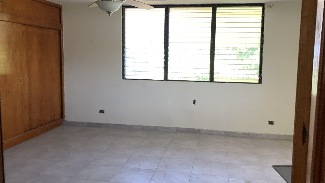 Sold by Owner Spacious House for Sale in Delmas 65, Port-au-Prince, Haiti – 5 Grand Bedrooms, 4 Bathrooms, Living & Dining Rooms, Modern Kitchen, 3 Huge Balconies, Large Backyard, Servant Quarter, Storage Rooms, Water Reservoir & Towers,  Built in 1989 on 516m² (6 Centiemes or 5,554.18) of Flat Land, 5+ Car Parking Spaces, High Walls/Fences, Safe Mixed Residential & Commercial Neighborhood – 15+ Office Space Conversion or Private Multi-Family Home