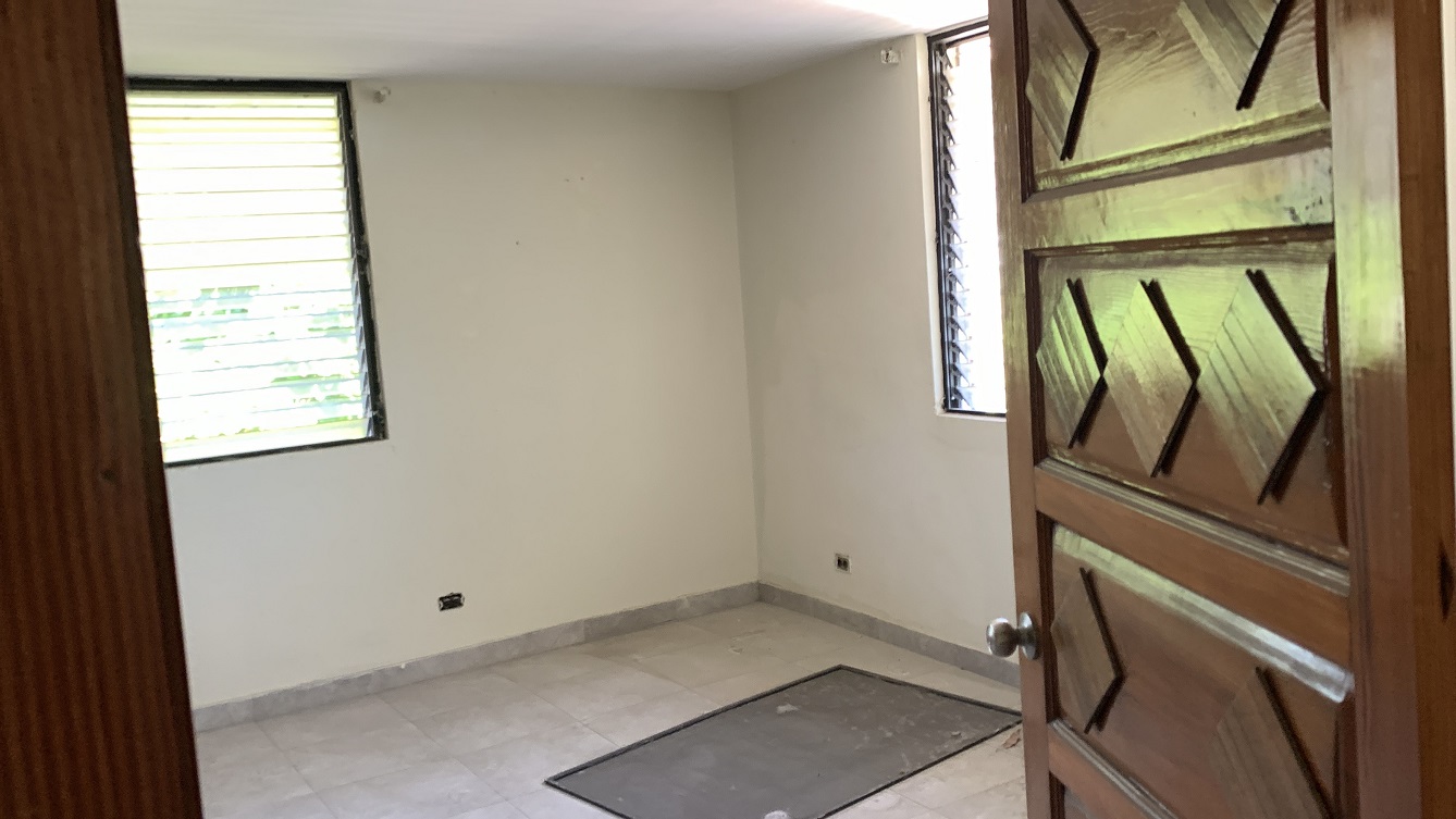 Sold by Owner Spacious House for Sale in Delmas 65, Port-au-Prince, Haiti – 5 Grand Bedrooms, 4 Bathrooms, Living & Dining Rooms, Modern Kitchen, 3 Huge Balconies, Large Backyard, Servant Quarter, Storage Rooms, Water Reservoir & Towers,  Built in 1989 on 516m² (6 Centiemes or 5,554.18) of Flat Land, 5+ Car Parking Spaces, High Walls/Fences, Safe Mixed Residential & Commercial Neighborhood – 15+ Office Space Conversion or Private Multi-Family Home