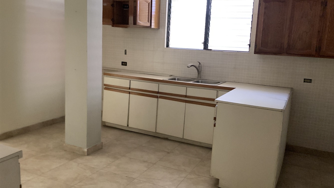 Sold by Owner Spacious House for Sale in Delmas 65, Port-au-Prince, Haiti – 5 Grand Bedrooms, 4 Bathrooms, Living & Dining Rooms, Modern Kitchen, 3 Huge Balconies, Large Backyard, Servant Quarter, Storage Rooms, Water Reservoir & Towers,  Built in 1989 on 516m² (6 Centiemes or 5,554.18) of Flat Land, 5+ Car Parking Spaces, High Walls/Fences, Safe Mixed Residential & Commercial Neighborhood – 15+ Office Space Conversion or Private Multi-Family Home