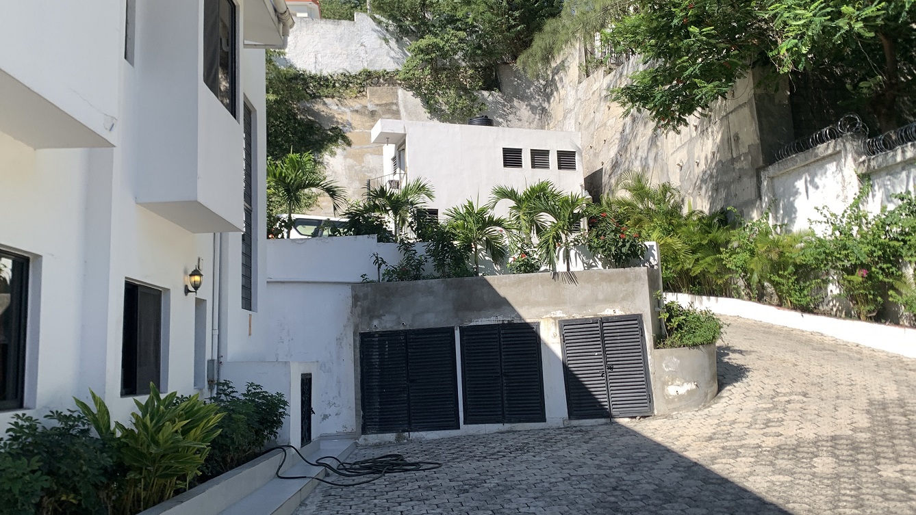 Profitable Luxury Furnished Apartments for Sale in Bourdon (Reimbol), Port-au-Prince, Haiti – 3 Complexes, 6 Units, 15 Bedrooms, 21 Bathrooms, Sparkling Swimming Pool, Fruits & Vegetables, Robust Solar-Powered System, Commercial-Size Power Generator – FULL CAPACITY YEAR-ROUND BUSINESS – Private/Exclusive Village with Three (3) Armed Guard Check-in Gates – Home to Haiti’s Oligarchs, United Nations Employees, ACTED, Solidarity, Ambassadors, etc.
